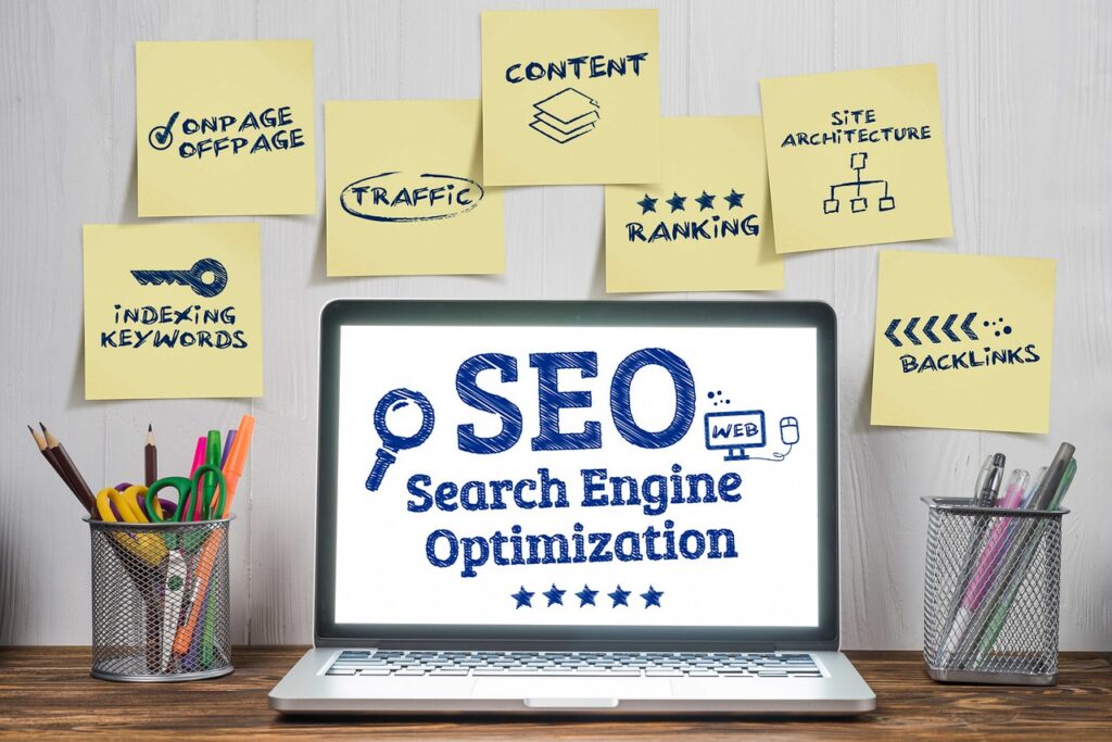 Search Engine Optimization Orange County. Orange County SEO Company. SEO Company Orange County. The words Search engine optimization displayed on a laptop. There are containers with pens, pencils and scissors on the left and right of the laptop. This image was found on Pixabay and is used according to Pixabay's license.